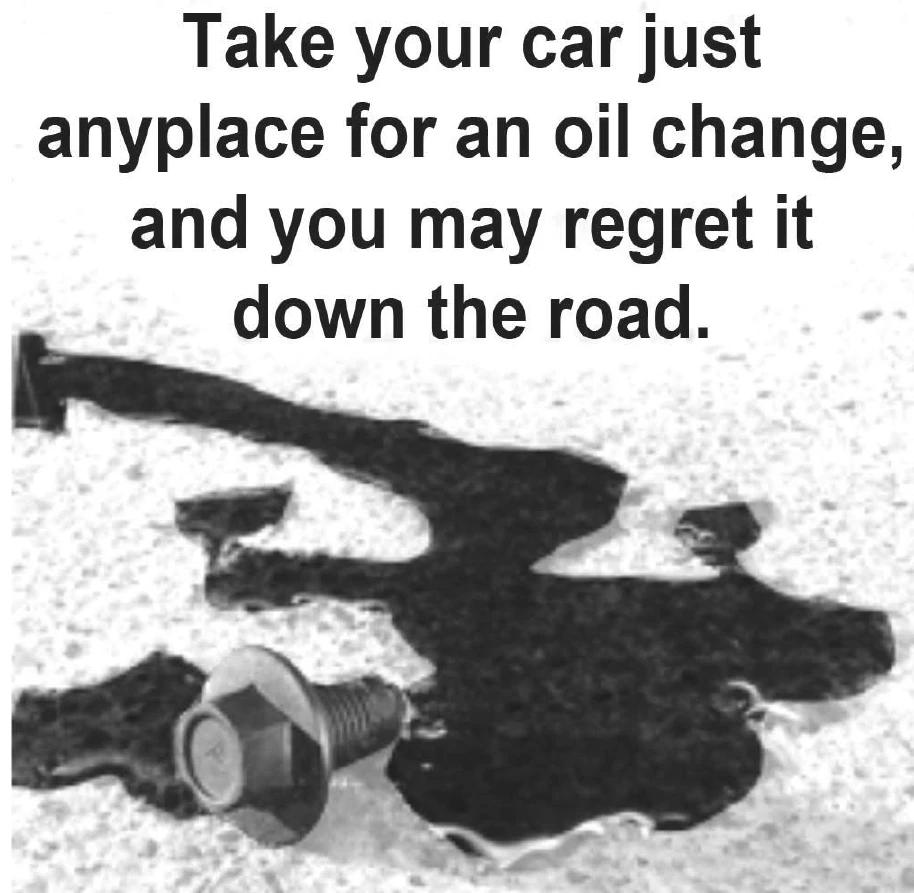 anúncio com a frase “Take your car just anyplace for an oil change, and you may regret it down the road.” sobre a foto de uma poça de óleo escuro no asfalto, com um parafuso solto ao lado
